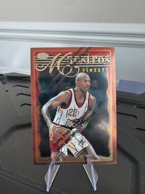 1996 Clyde Drexler Topps Finest Maestros with protective seal. #trailblazers
